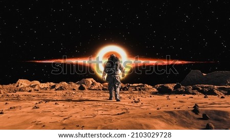 A background of an astronaut on the mars looking at the planet