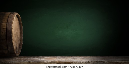 background barrel and worn old table of wood