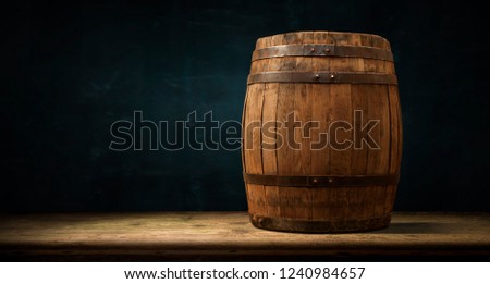background of barrel and worn old table of wood