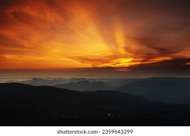 Background of beatiful twilight sunset over the mountain in north of Thailand.
