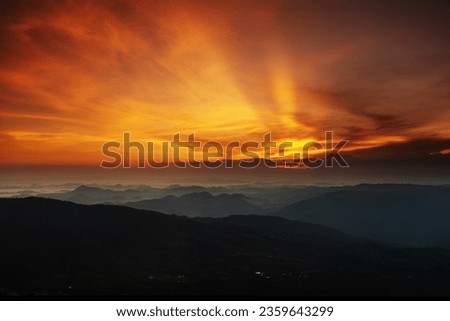 Background of beatiful twilight sunset over the mountain in north of Thailand.