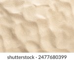 background of beige beach sand with natural pattern