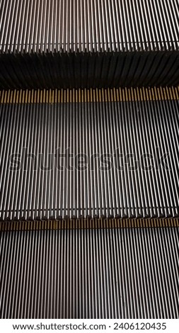 Background of black escalator stairs running