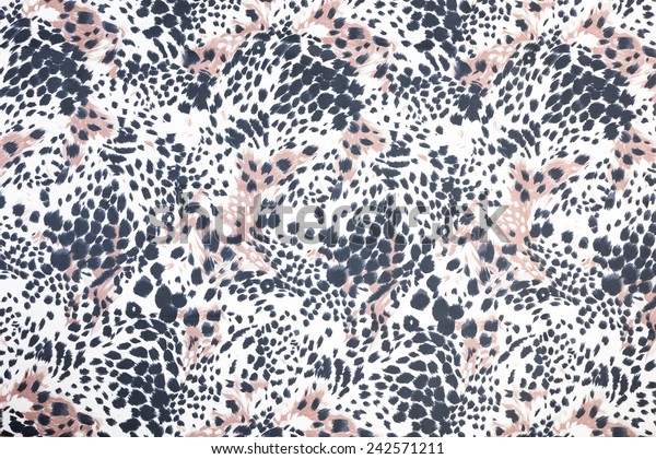 Background of black\
spotted animal fur\
print