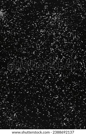 background. black background with white splashes of different sizes and shapes. artificial snow