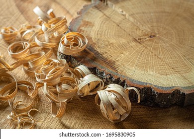Background blank, oak wood with shavings, oak end saw, end grain, woodwork