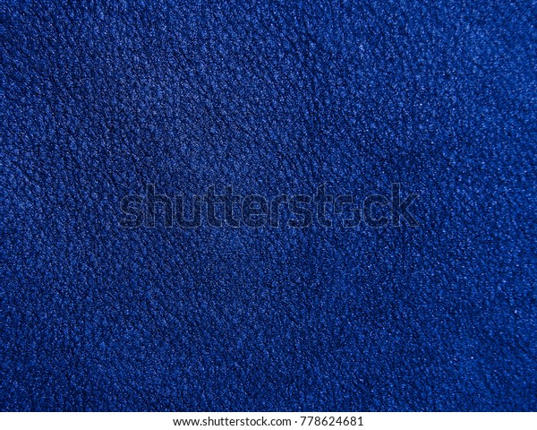 Background of blue suede\
leather