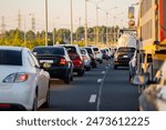 Background, bluer, blurred focus. Traffic jams on the highway during the holidays. Departure from the city for the weekend outside the city.