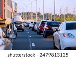 Background, bluer, blurred focus. Traffic jams on the highway during the holidays. Departure from the city for the weekend outside the city.