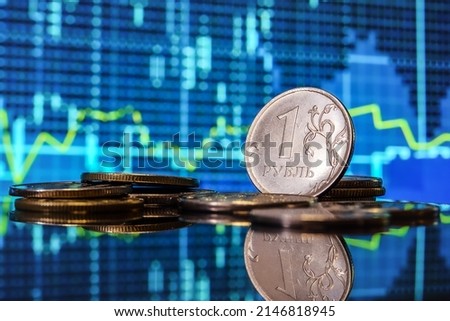 Background, blur, out of focus, bokeh, pasteurization. Coins of the Russian ruble. The rise of the ruble exchange rate. Payment for gas in Russian currency