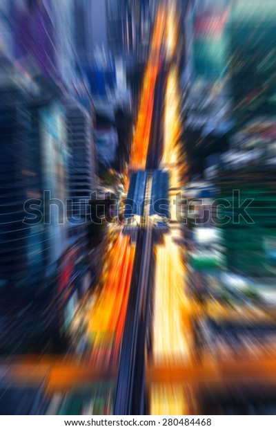 background\
blur of traffic of Bangkok night bird eye\
view