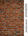 Background of bricks wall. Architecture background with bricks wall facade. Stone cladding wall background. Brick color. Brick surface background for poster or banner.