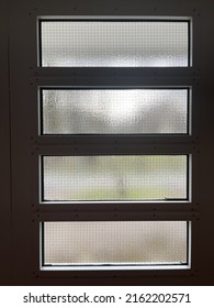 Background - Brown Door With Cloudy Glass