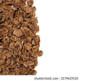 Background Of Brown Sweet Cereals With Free Space For Text And Advertising. The Concept Of A Fast Carbohydrate Energy Breakfast Or Meal. Flakes From Durum Wheat And Cereals