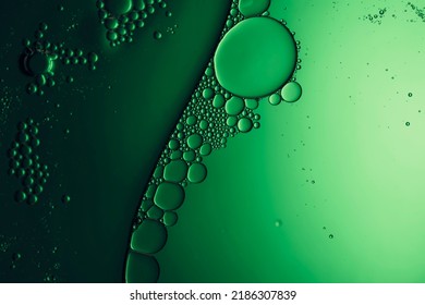 background with bubbles in green liquid - Shutterstock ID 2186307839