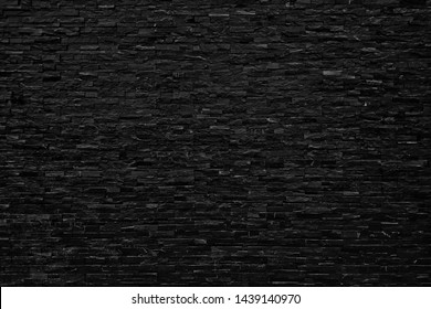 Background of building black brick wall pattern block vintage wallpaper.Dark black tone - Shutterstock ID 1439140970