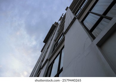 background of building with windows and sky