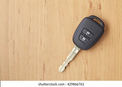 background of car key on the wooden table