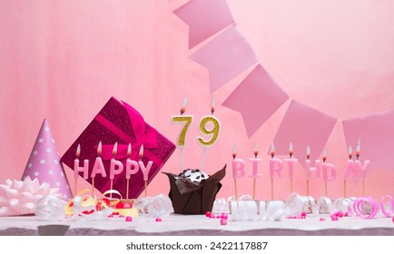 Background card date of birth for a girl  79. Anniversary. Beautiful festive background with candles. Women's congratulations card with a cake. Happy birthday in pink. copy space
