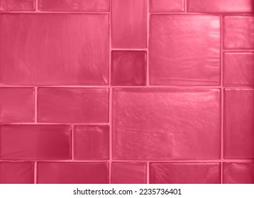 Background of ceramic tiles in new trendy color of 2023 Viva Magenta. Monochrome. Abstract. Wallpaper for blogs in social networks. Copy space - Shutterstock ID 2235736401