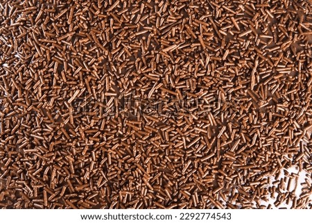 Background with chocolate cake texture and brigadeiro frosting..