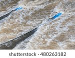 Background Close-flowing tributaries with a nylon mesh to trap small fish on a dam spillways.