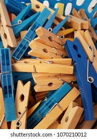 Background clothespins.
Many tongs, plastic and wood texture.