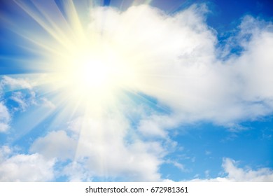 Background of clouds with sun - Shutterstock ID 672981361