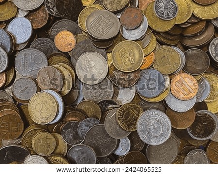 Background of a collection of old coins, money coins from different countries.
