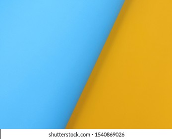 Background of color paper blue and yellow.          - Shutterstock ID 1540869026