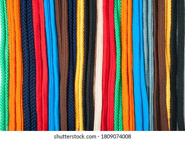 Background Of Colored Shoelaces. Texture