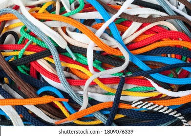 Background Of Colored Shoelaces. Texture