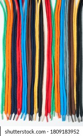 Background Of Colored Shoelaces. Texture