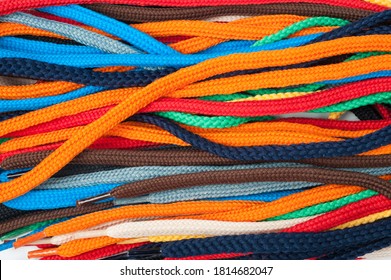 Background Of Colored Shoelaces. Texture