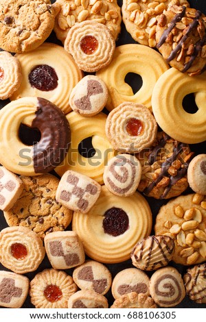 Background of cookies assorted close-up. Vertical view from above
