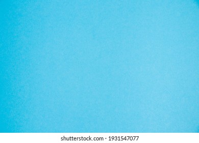 Background with copy space. Colored blue paper or cardboard with space for text, horizontal format.