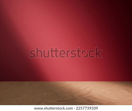 Background for a cosmetic, fragrance or beverage product packshot - red plaster wall and wooden table in the foreground
