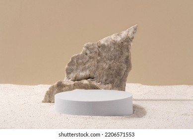 Background for cosmetic products of natural beige color. Stone podium on the sand. Front view. - Shutterstock ID 2206571553