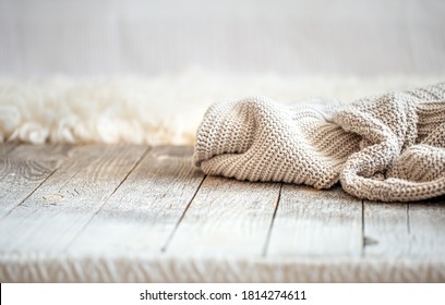 Background with a cozy knitted sweater, space for text. Minimalism, knitted texture, order, comfort, macro. Banner with copy space for text. - Powered by Shutterstock