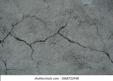 background with cracked cement motif. - Shutterstock ID 1868722948
