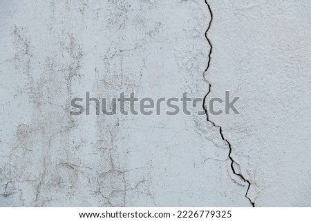 Background of cracked concrete wall.