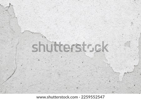 background, cracked wall, covered with multi-layer paint. fragments of chipped plaster from the wall. Interesting texture, overlay. Space for copy. Copy space. Banner. Old Grunge Abstract Background.