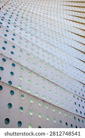 Background created with a concrete structure with green glass circles. Contemporary architectural details.
