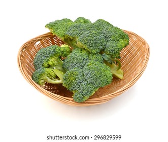 Background Of Crown Broccoli Isolated In Basket On White 