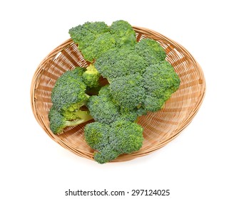 Background Of Crown Broccoli Isolated In Basket On White 