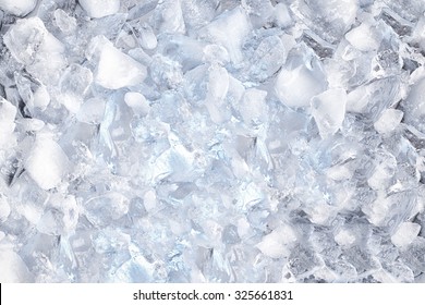 background with crushed ice cubes, top view