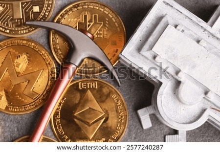 background of crypto coins and coal mining pickaxe
