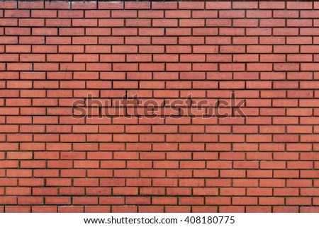 Background of dark red brick wall 