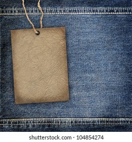 Background denim texture with cardboard label