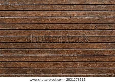 A background depicting the texture of brown, rustic wooden planks